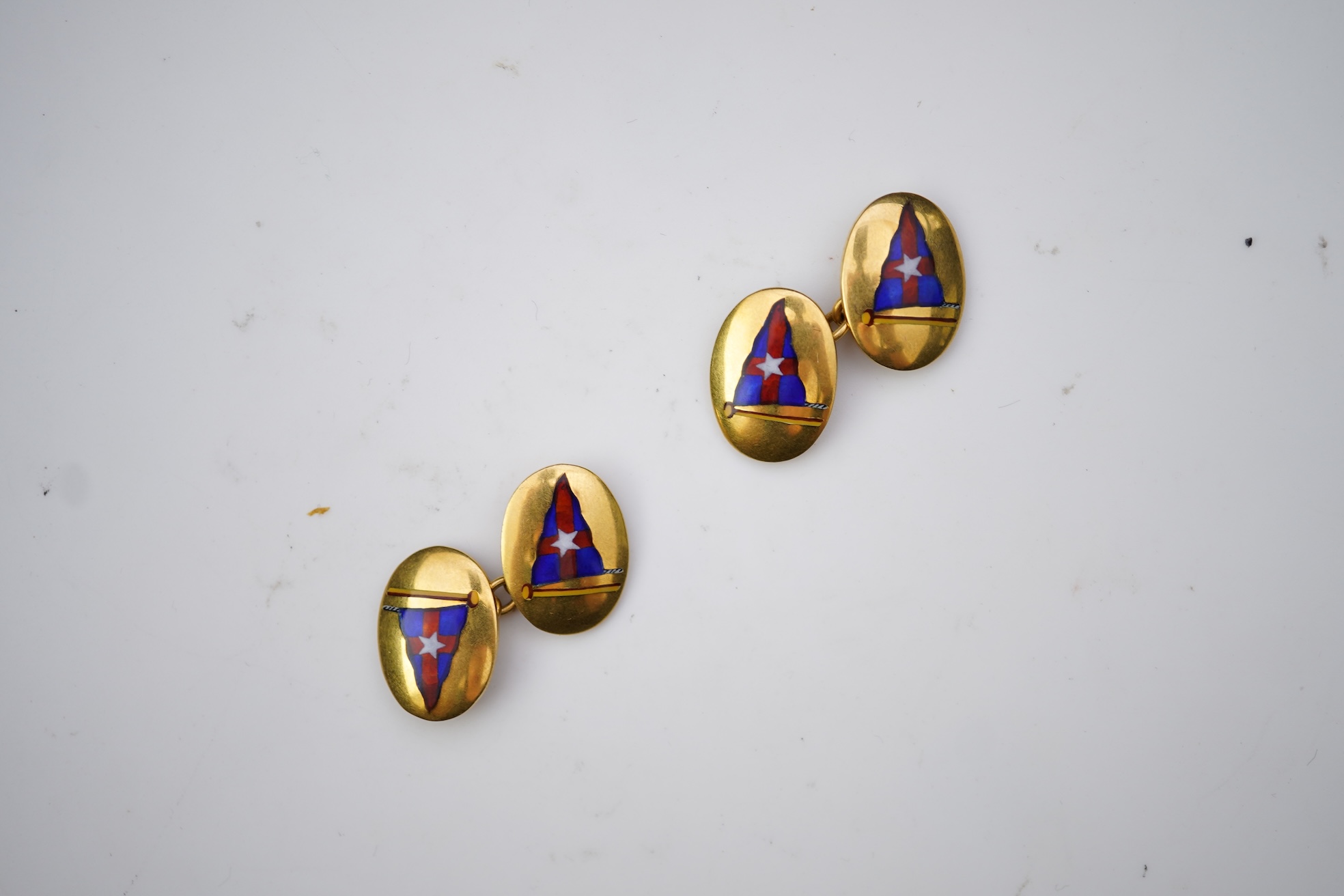 A pair of 9ct gold and enamel cufflinks, circa 1966